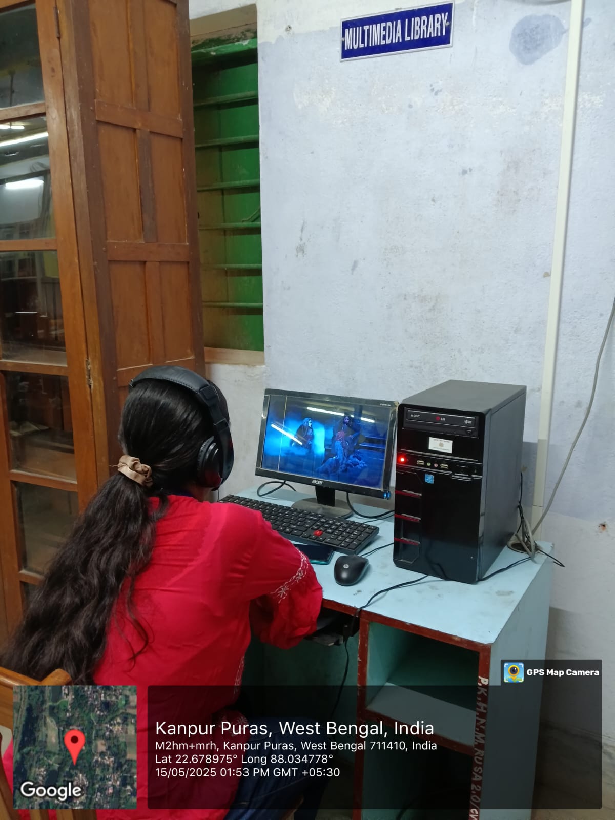 Student learning Shakespearean Play at Multimedia Library